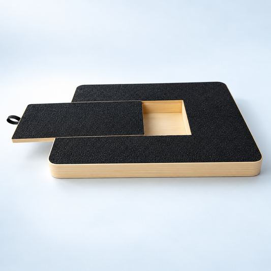 PawFile black rectangular wooden dog nail scratch board with the sliding lid open to reveal the treat compartment